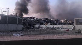Smoke billows into air as sirens ring out in aftermath of Beirut explosion
