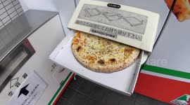 This vending machine in Japan sells hot pizza 24 hours a day