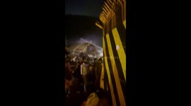 Passenger plane carrying nearly 200 crashes off runway in south India