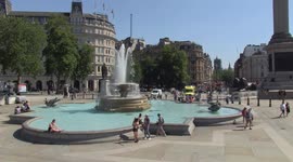 Londoners cool off at Trafalgar Square fountains on 'Furnace Friday'