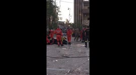 Polish fire fighters resting after doing a final search for servivors and corpses