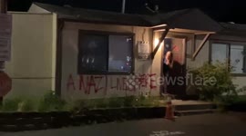 'I never said I was a Nazi!' Portland woman seen earlier in Nazi armband has home defaced