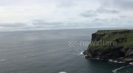 Holiday makers risk there lives climbing cliffs