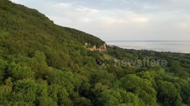 Gwrych Castle - Summer Solstice Sunrise drone panning shot