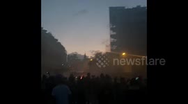 Smoke fills the air as protesters set barricades on fire during clashes in Beirut