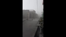 15 minutes after erupting, Mount Sinabung ash soaks a nearby village-File1