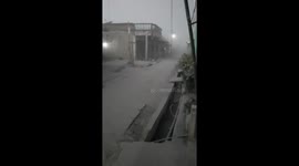 15 minutes after erupting, Mount Sinabung ash soaks a nearby village-File2