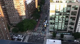 Hundreds of Bicycle Protesters for BLM cross 2nd Avenue in NYC while Ringing Bells