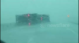 Truck overturns on highway during Iowa derecho