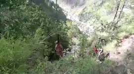 Locals use crane to rescue bovine stranded inside 30-foot-deep trench in northern India