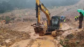 Vehicles and bodies recovered after deadly landslide in southern India