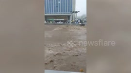 South Korea river rages under bridge during floods