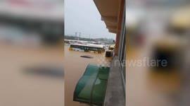 Cars submerged by deadly monsoon floods in South Korea