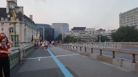 We Are Events protesters line up on Westminster bridge for protest