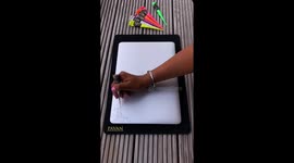 Record-holding henna artists decorates MacBook with day-glow design