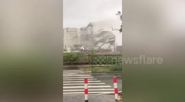 Typhoon Mekkhala rips off cement container's metal cover at Chinese factory