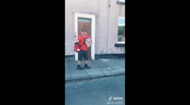 This UK postie got the Friday feeling while dancing on his round