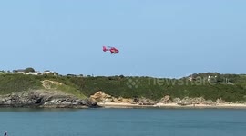 Helicopters attend scene where 85-year-old woman is pulled from sea on UK beach
