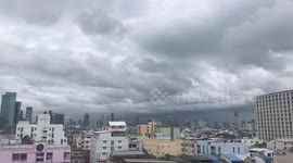 Dark grey clouds bring rainstorms to Bangkok