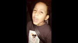 Kid singing with passion savage love