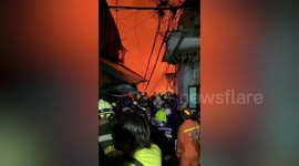 Two injured as hundreds flee burning homes in Bangkok, Thailand