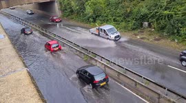 Climate Change brings more flooding to Watford's roads flooded by rain storms UK