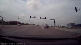 US motorcyclist 'avoids death' after speeding car fails to stop at intersection
