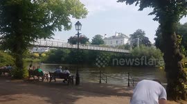 Lads jumping off Chester suspension bridge in August Heatwave
