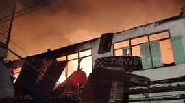 Fire injures two and rips through 90 homes in Bangkok, Thailand