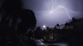 Intense Lightning Strike Lights up UK Streets (slow motion)