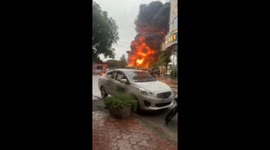 Explosive fire billows smoke at Vietnamese paint factory