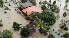 Homes and fields submerged by rainy season floods in eastern Thailand