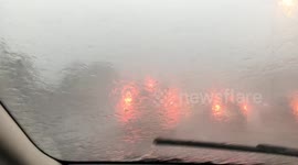 Torrential rain and road flooding, Junction 7 and 8, M25 motorway, Surrey, UK - 13 August 2020