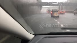 Motorway severe flooding near Junction 7 in Surrey, UK