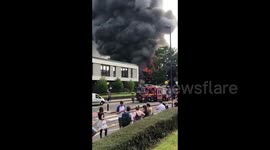Fire rages in Birmingham, England as crews respond