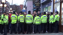 West Ham football funs going home with the police at Earl's court station, London 2016