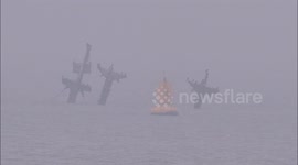 Shipwreck SS Richard Montgomery looks eerie on misty evening in Kent, UK