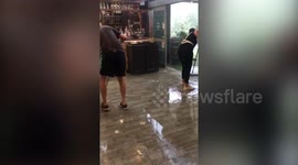 Garden centre visitors almost washed away clutching their carrot cake after extreme weather causes cafe to flood