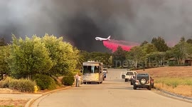 Boeing 747 Supertanker drops fire retardant on River Fire in California
