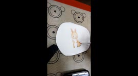 The Vietnamese baker creates a beautiful rabbit on top of the cake