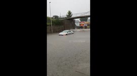 Aberdeen, Scotland motorist stranded as bus drives through deep floodwater
