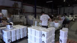 Global Medic volunteers in Toronto prepare food aid for Beirut