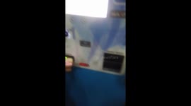 Talking to a parking lot robot in Malaysia