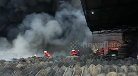 Fire continues to rage at used tyre factory in Indonesia