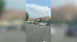 Smoke rises from brush fire In California
