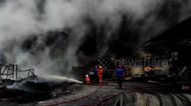 Fire continues to rage at tyre factory in Indonesia