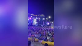 Crowds seen packed into water park for music festival in Wuhan, China