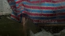 Typhoon Higos batters homes in Hong Kong while moving towards China