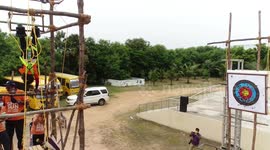 Indian 5-year-old attempts world record after shooting 111 arrows while hanging upside down