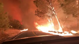 Terrifying footage of photographer's journey through heart of wildfire burning in California